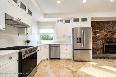 Rare opportunity to own a beautifully renovated property with - photo 9