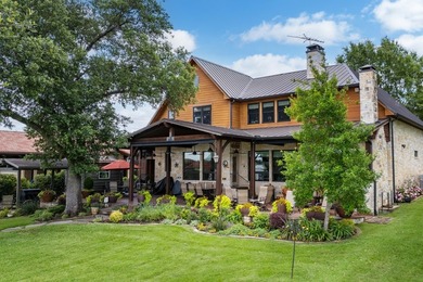Exceptional lakefront living begins with a striking stone - photo 30