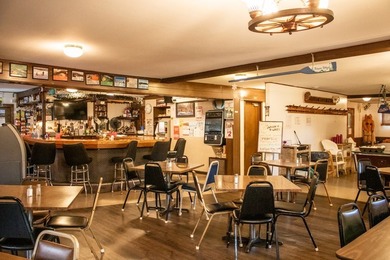 Discover *The Wagon Wheel,* a beloved bar and restaurant located - photo 30