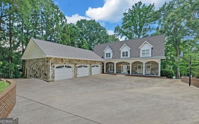 Experience exceptional waterfront living in this stunning - photo 1
