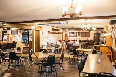 Discover *The Wagon Wheel,* a beloved bar and restaurant located - photo 31