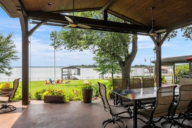 Exceptional lakefront living begins with a striking stone - photo 34