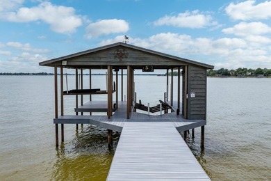 Exceptional lakefront living begins with a striking stone - photo 37