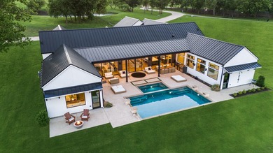 This custom-designed architectural showpiece offers 4,100 sq ft - photo 38