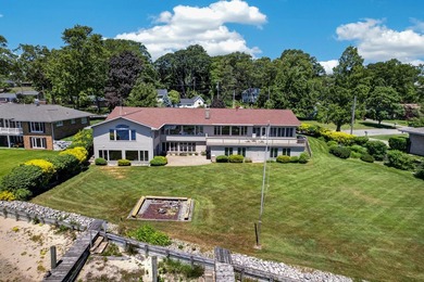 Experience extraordinary waterfront living at 909 Tostenabe Lane - photo 11