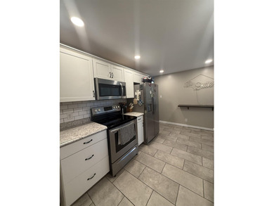 Move right into 217 Rooney Drive! This charming home offers a - photo 11