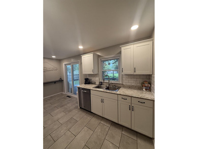 Move right into 217 Rooney Drive! This charming home offers a - photo 12