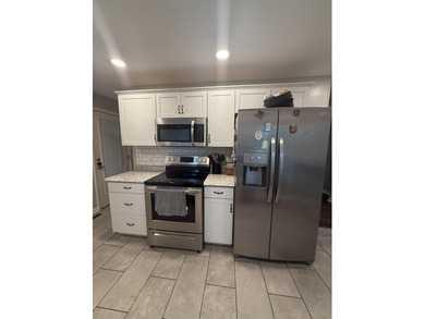 Move right into 217 Rooney Drive! This charming home offers a - photo 14