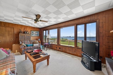 Experience extraordinary waterfront living at 909 Tostenabe Lane - photo 21