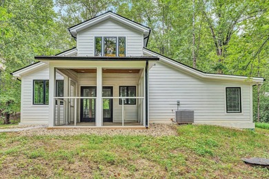 Recently completed lake cottage with lots of charm, screened in - photo 25