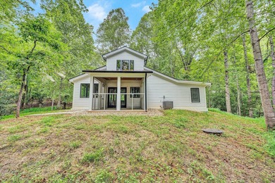 Recently completed lake cottage with lots of charm, screened in - photo 26