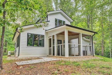 Recently completed lake cottage with lots of charm, screened in - photo 27