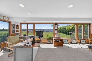 Experience extraordinary waterfront living at 909 Tostenabe Lane - photo 32