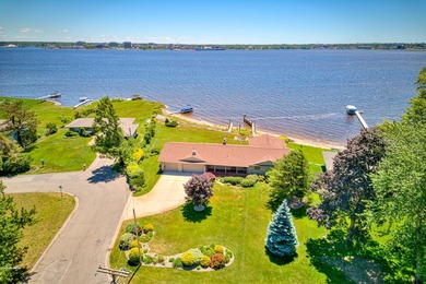 Experience extraordinary waterfront living at 909 Tostenabe Lane - photo 36