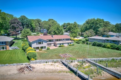 Experience extraordinary waterfront living at 909 Tostenabe Lane - photo 45