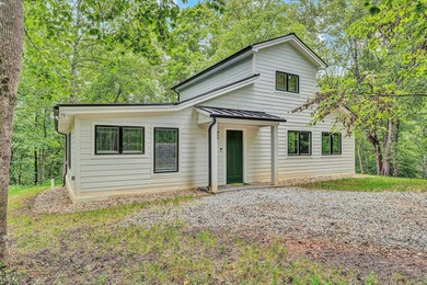 Recently completed lake cottage with lots of charm, screened in - photo 47