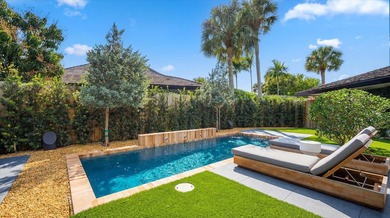 Tucked within the sought-after Palm Beach Polo community, this - photo 4