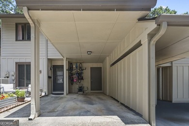 Welcome to this inviting end-unit townhome nestled in the highly - photo 4