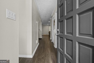 Welcome to this inviting end-unit townhome nestled in the highly - photo 5