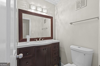 Welcome to this inviting end-unit townhome nestled in the highly - photo 8