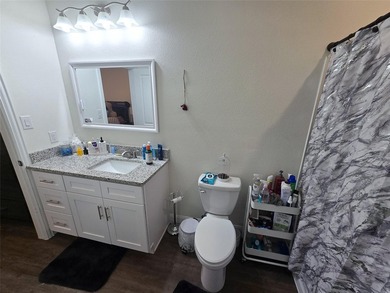 This modern 3-bedroom, 2-bathroom house offers an inviting blend - photo 15