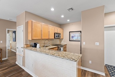 This beautifully maintained 3rd floor 3/2 condo with *forever*