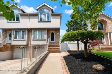 Only one 2-family home in Tottenville under 1 million! Located - photo 1