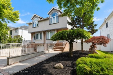 Only one 2-family home in Tottenville under 1 million! Located - photo 2