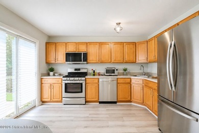 Only one 2-family home in Tottenville under 1 million! Located - photo 5