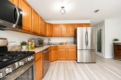 Only one 2-family home in Tottenville under 1 million! Located - photo 6