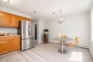 Only one 2-family home in Tottenville under 1 million! Located - photo 7