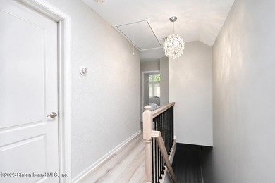 Only one 2-family home in Tottenville under 1 million! Located - photo 9