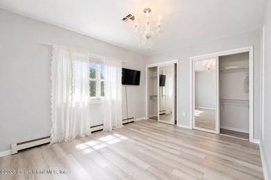 Only one 2-family home in Tottenville under 1 million! Located - photo 10
