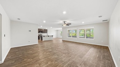 Welcome to a beautifully maintained 4-bedroom, 2-bath home in - photo 3