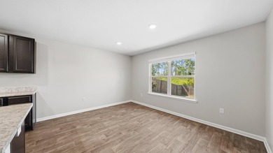 Welcome to a beautifully maintained 4-bedroom, 2-bath home in - photo 5