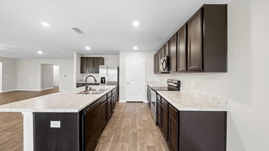 Welcome to a beautifully maintained 4-bedroom, 2-bath home in - photo 7