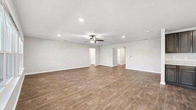 Welcome to a beautifully maintained 4-bedroom, 2-bath home in - photo 8