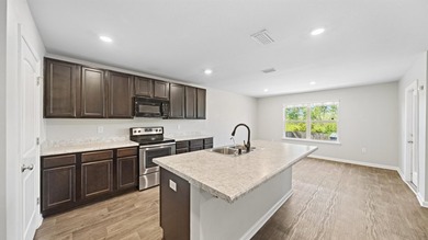 Welcome to a beautifully maintained 4-bedroom, 2-bath home in - photo 9