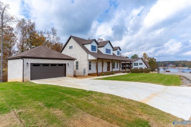 New Full Brick Home. Gorgeous view of Smith Lake. Gated - photo 1