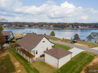 New Full Brick Home. Gorgeous view of Smith Lake. Gated - photo 8