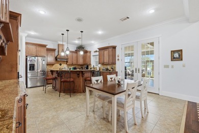 Beyond a private gated entrance, discover an elegant - photo 12