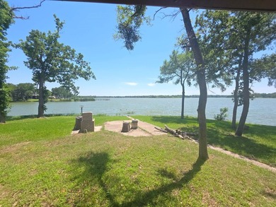 Check out this waterfront brick home on Lake Mexia! It's the - photo 4