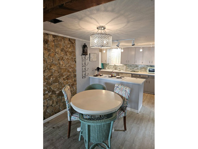 Check out this waterfront brick home on Lake Mexia! It's the - photo 8