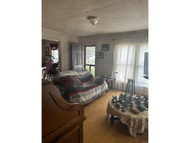 property is deep rather than wide  it consists of an older 1474