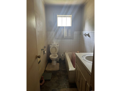 property is deep rather than wide  it consists of an older 1474