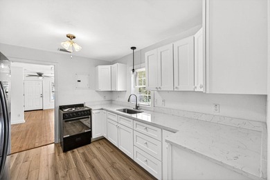 Updated & Move-In Ready! This remodeled 3-bedroom, 1.5-bath home - photo 9