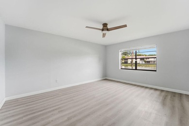 FULLY RENOVATED, 1st-FLOOR, LAKE FRONT condo located in the - photo 12