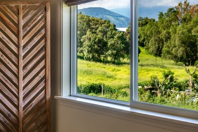 Nestled in Pu'uanahulu, this 2 bedroom, 2.5 bathroom home offers - photo 13