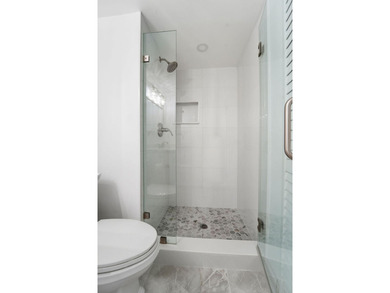 FULLY RENOVATED, 1st-FLOOR, LAKE FRONT condo located in the - photo 19