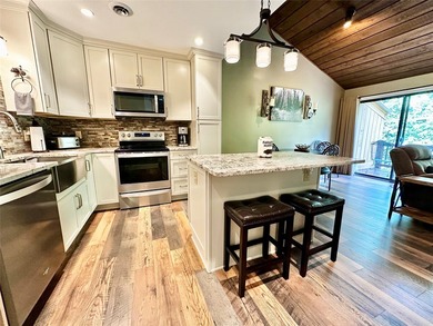 Experience refined mountain living in this warmly appointed - photo 10